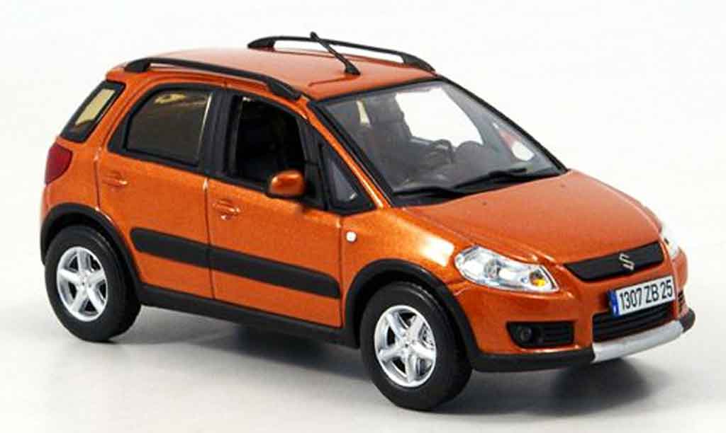 Suzuki SX4 1/43 Norev orange 2006 miniature