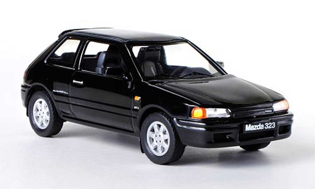 Mazda 323 1/43 IXO GTX noire LHD 1989 miniature