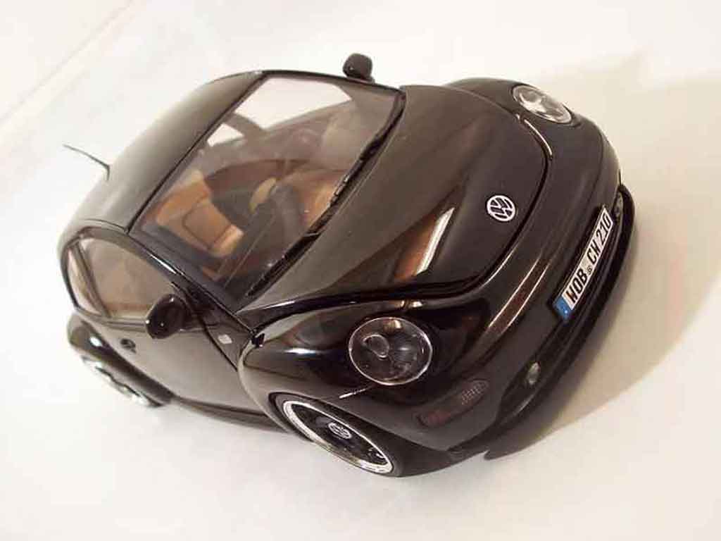 Volkswagen New Beetle 1/18 Solido men in black tuning miniature