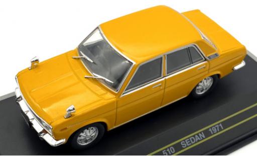 Datsun 510 1/43 First 43 Models Sedan dunkeljaune RHD 1971 miniature